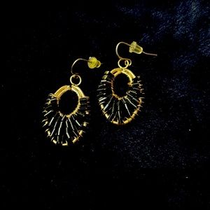 Gold earrings with black beads
